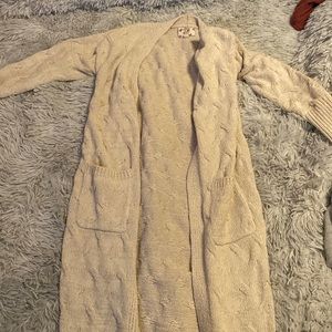 A long comfy tan cardigan with pockets.